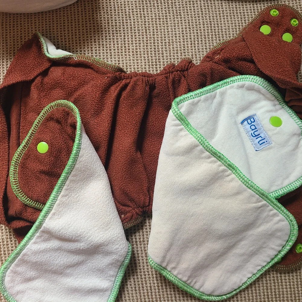 FOUR BAYRLI HEAVY WETTER CLOTH DIAPERS AND COVERS